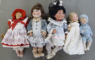 Dolls: to include an early 20thC Armand Marseille bisque head example with painted features, on a