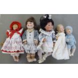 Dolls: to include an early 20thC Armand Marseille bisque head example with painted features, on a