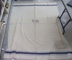 A vintage cream woollen blanket, bearing the label 'Windsor Castle, Room No.659, VR 1866'