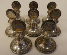 A set of eight loaded silver menu/place setting holders  stamped 925 with Birmingham marks  2"h