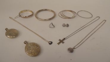 White and silver coloured metal items of personal ornament: to include bangles and lockets