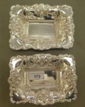 A pair of silver sweet dishes with embossed ornament  Chester marks rubbed  6"w