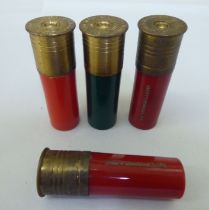 A pair of US made Pachmays novelty, cartridge design condiments pots; and a pair of similar
