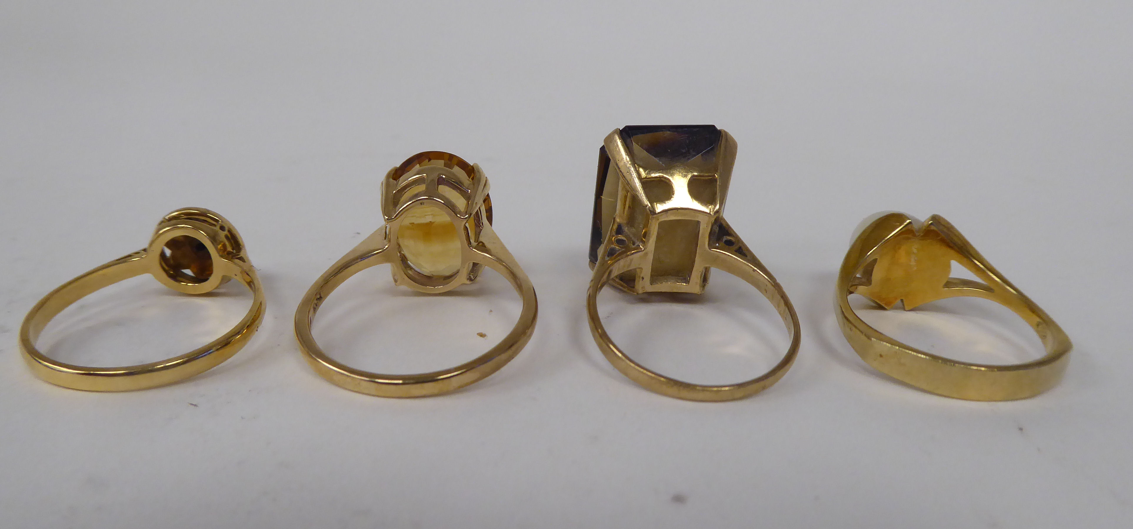 Four various 9ct gold and other dress rings, one claw set with a citrine - Image 3 of 3