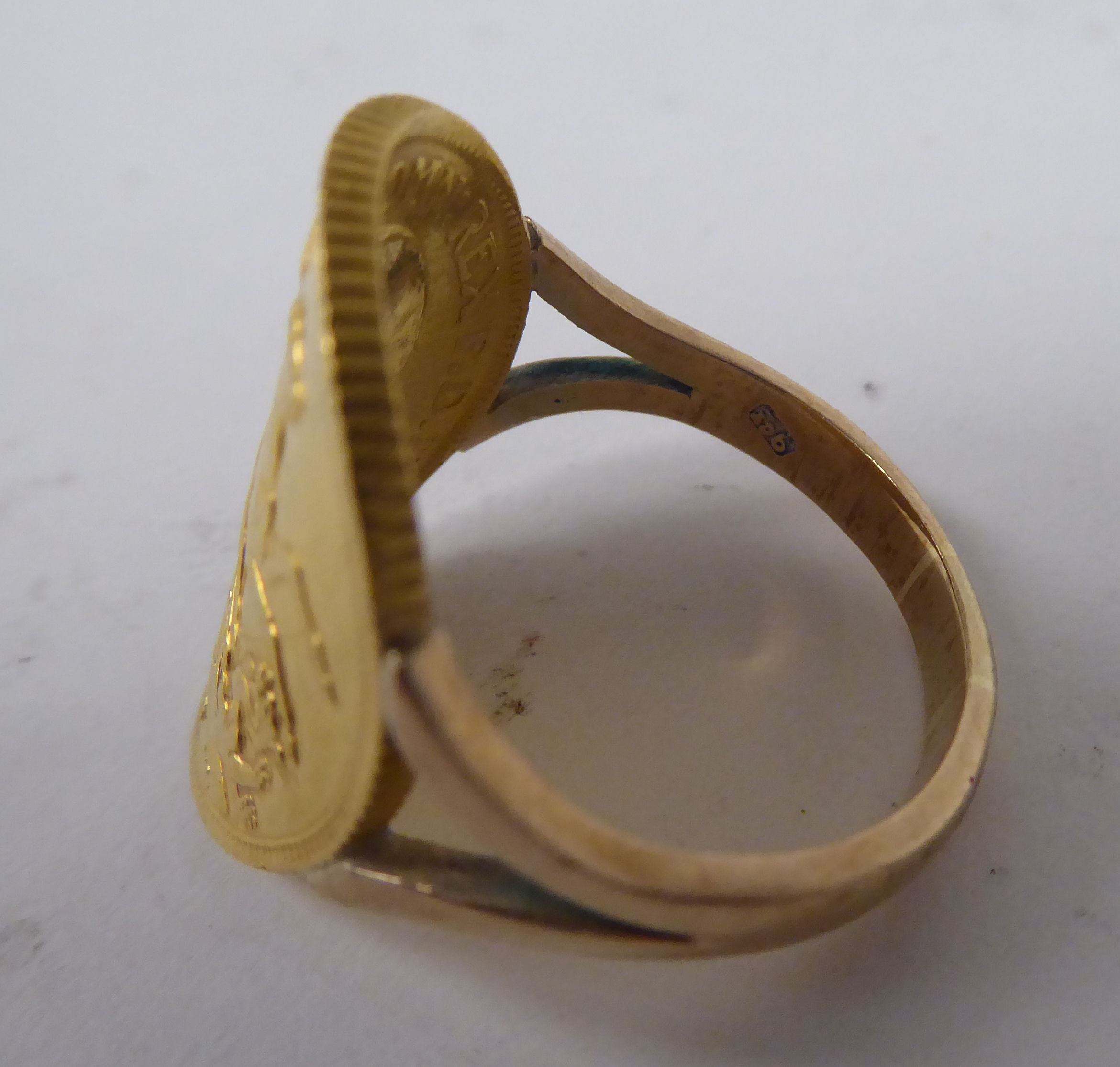 A gold coloured metal signet ring, incorporating a George V sovereign, St George on the obverse - Image 3 of 4