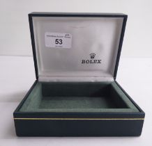 A hinged Rolex watch box