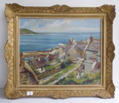 McMichol - a village coastal scene  oil on canvas  bears a signature  17" x 21"  framed