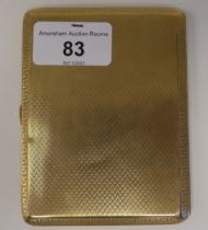 A 9ct gold cigarette case with engine turned decoration  (134 grams total weight)