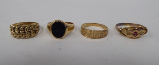 Four dissimilar 9ct gold rings