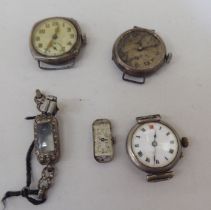 Four white metal cased wristwatches  mixed marks
