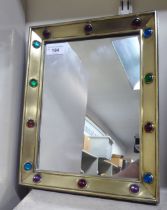 A mirror, set in a mitre brass frame, set with coloured glass beads  13" x 10"