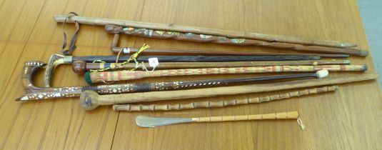 Walking sticks and canes: to include a mother-of-pearl inlaid fruitwood example