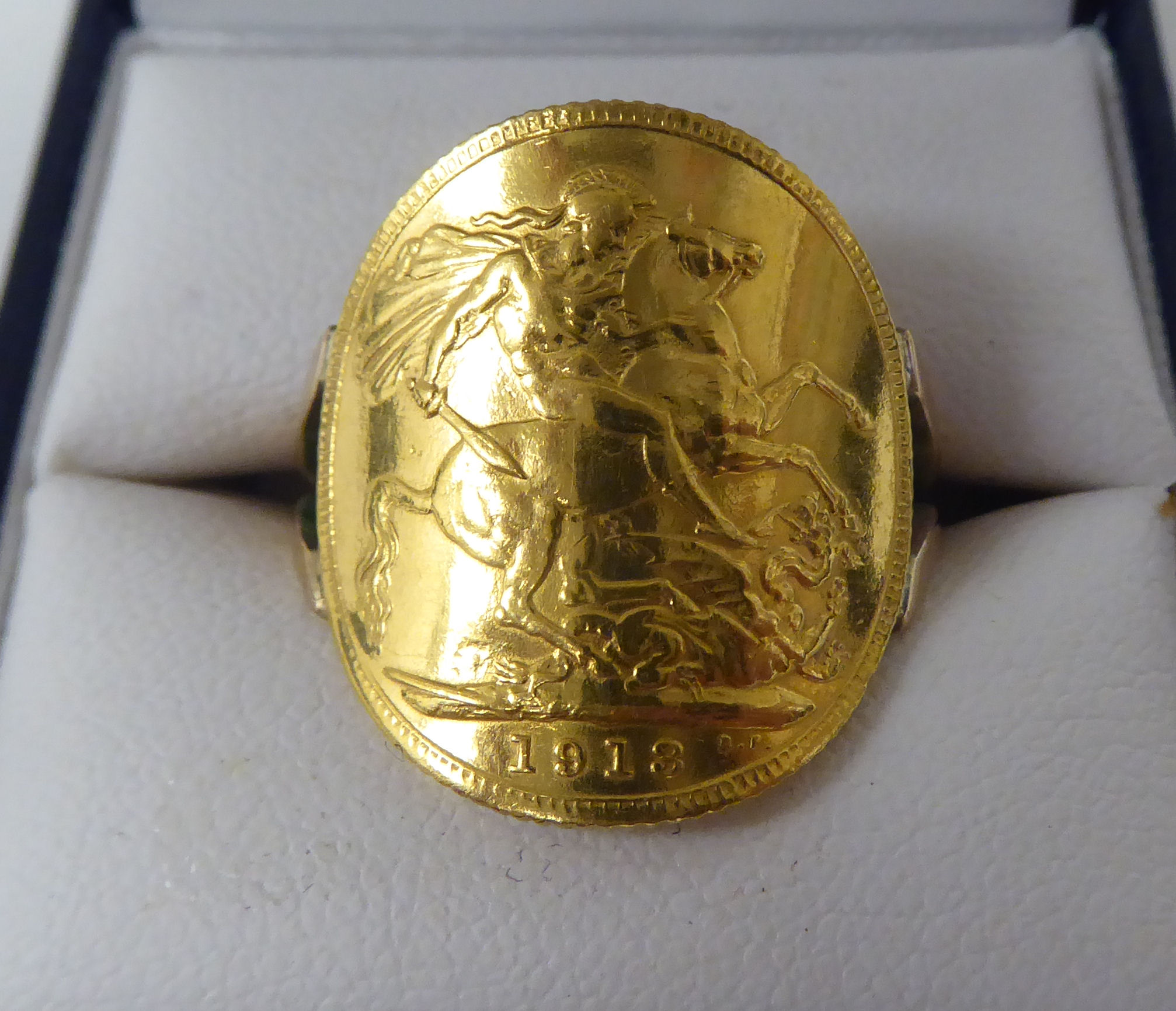 A gold coloured metal signet ring, incorporating a George V sovereign, St George on the obverse - Image 4 of 4