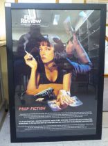 A framed film poster for 'Pulp Fiction'  36" x 23"