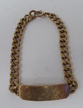 A 9ct gold curb link identity bracelet
