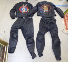 Two sets of Crowtree black motorcycle leathers, one with Scoobydoo on the back of one jacket, the