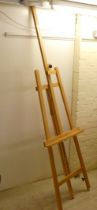 A modern Artistik folding beech artist's easel  81"h