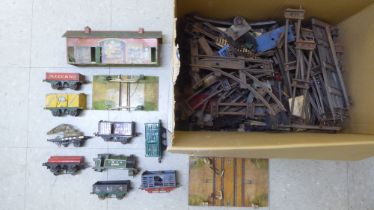 Model railway related items by Hornby: to include track, tinplate buildings and rolling stock