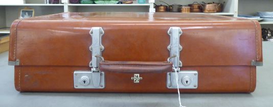 A vintage Revelation moulded hide effect suitcase  24"w