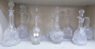 Decanters: to include an ovoid shaped example with a slender neck and stopper