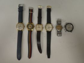 Six variously cased and strapped wristwatches