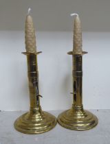 A pair of early 19thC brass ejector candlesticks  7"h