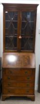 A modern crossbanded mahogany bureau bookcase, raised on bracket feet  79"h  29"w