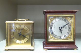 A London Clock Company lacquered brass cased mantel timepiece; faced by a Roman dial  5.5"h; and