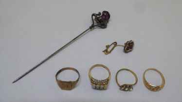 Items of personal ornament: to include a hatpin; and a yellow metal ring