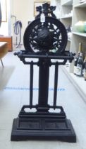 A reproduction of a Victorian black painted cast iron stickstand  35"h  17"w