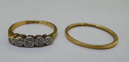 An 18ct gold wedding ring; and a 18ct gold ring, set with five white stones