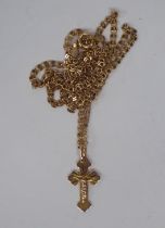 A 14ct gold pendant crucifix, on a fine fancy link neckchain and ring-bolt clasp