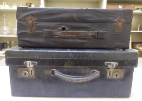 A vintage portable HMV gramophone, in a hard carrying case  5.5"h  15"w; and another hard case,