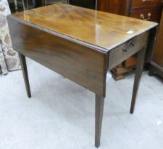 An early 19thC mahogany Pembroke table, raised on square, tapered legs  28"h  33"w