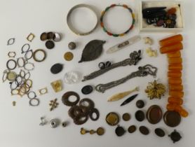 Items of personal ornament: to include amber coloured loose stones; and bangles