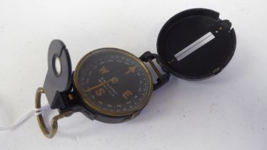 A World War II period W & LE Gurley Troy military compass with a black dial (Please Note: this lot