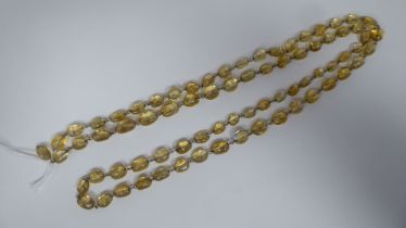 An antique necklace, set with uniform oval bead citrines