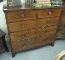 A mid 19thC mahogany dressing chest with two short/three graduated long drawers, cockbeading and