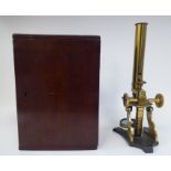 An early 20thC JH Steward, 406 Strand, London, lacquered brass microscope with accessories in a