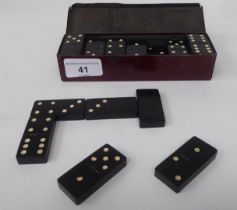 A set of Will's 'Pirate Shag' composition dominoes, in a printed promotional tinplate box