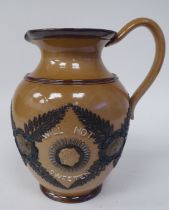 A late Victorian Doulton Lambeth brown and green glazed stoneware, ovoid shape jug, decorated in