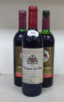 Wine: two bottles of 1975 Chateau du Puy; and a bottle of 1996 Chateau du Puy Grand Vin