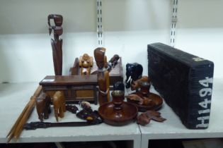 Wooden items: to include carved animals; and a book trough  6"w