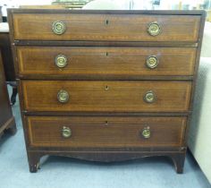 A Regency satinwood inlaid mahogany dressing chest with four graduated long drawers, raised on