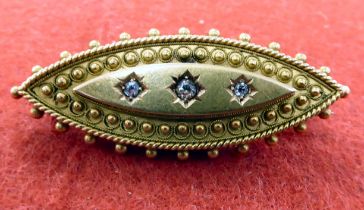 A late Victorian yellow metal mourning brooch, set with three diamonds