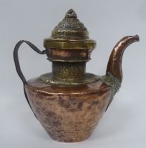 An 18th/19thC Tibetan copper and brass ewer with an S-shape spout, loop handle and cover, embossed