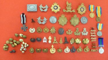 Miscellaneous military and associated cap badges; buttons and other emblems, some copies (Please