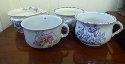 Four dissimilar 19thC china chamber pots: to include an example by Wedgwood