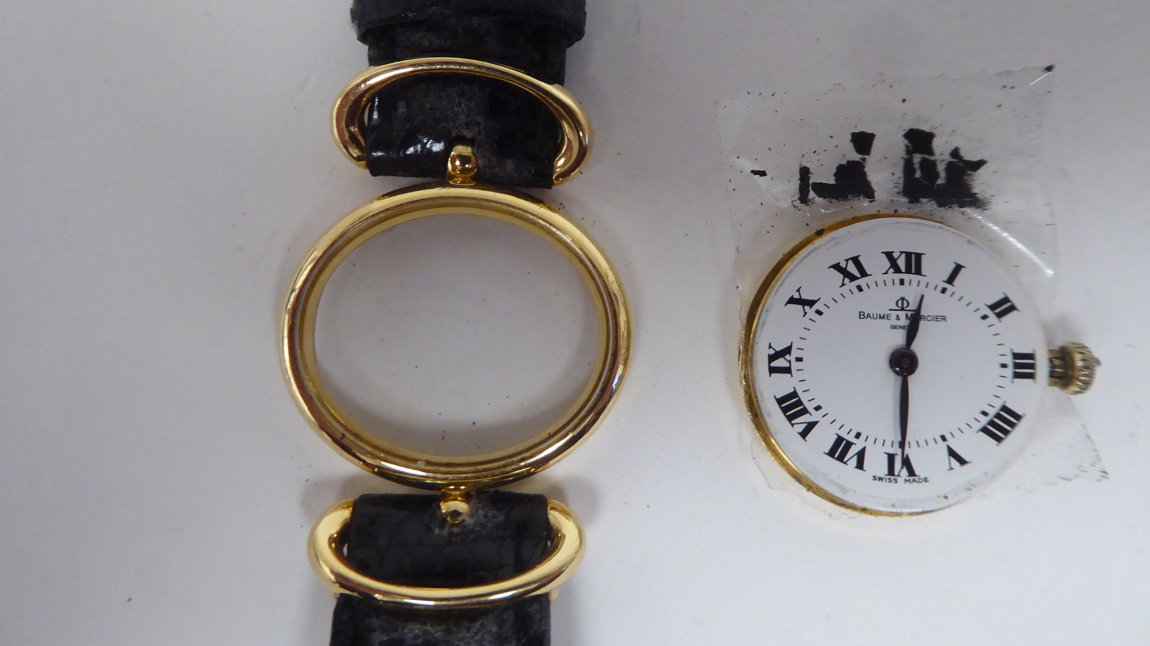 A lady's Baume & Mercia 18ct gold oval cased wristwatch, on a black hide strap - Image 4 of 4