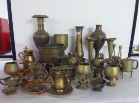 20thC decorative and functional metalware: to include horse brasses; and vases  largest 15"h